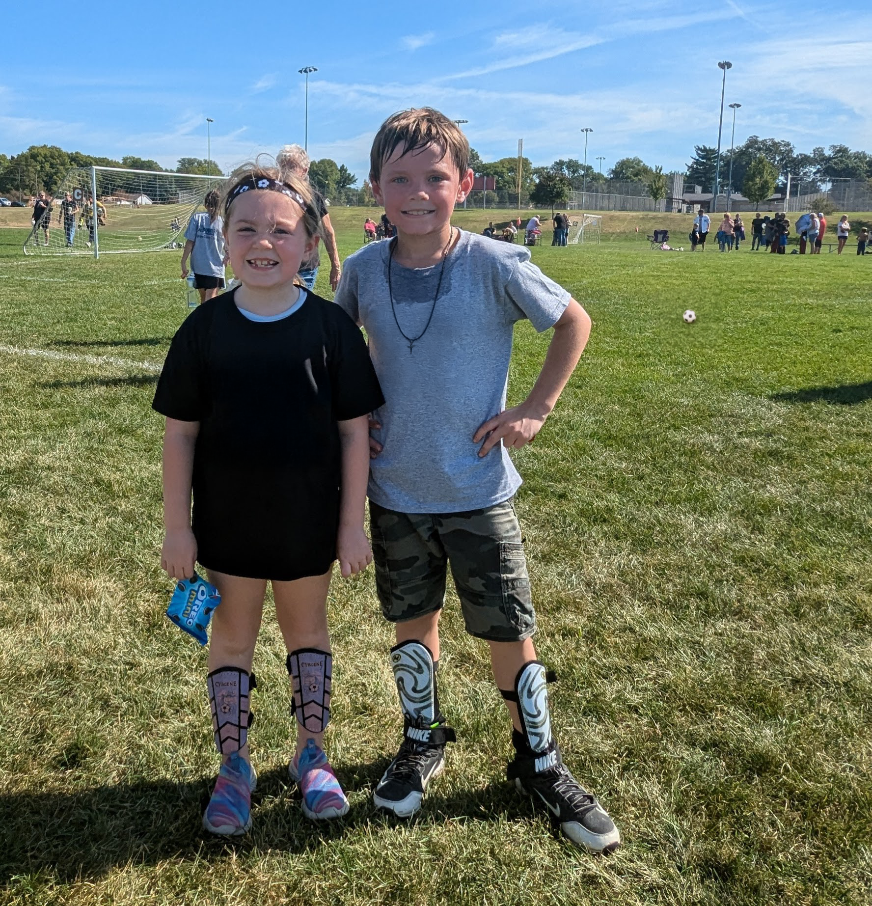 two kids dressed for soccer